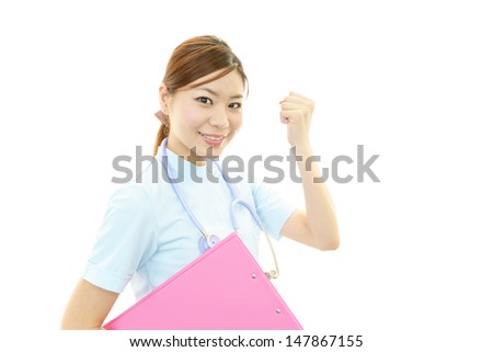 Smiling Asian female nurse