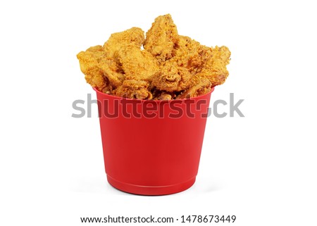 Delicious Crispy Fried Chicken small red Bucket - Front View - White Background - Close up  Royalty-Free Stock Photo #1478673449