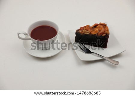 Cup of hot coffee with cake - White background pictures and natural light shadows