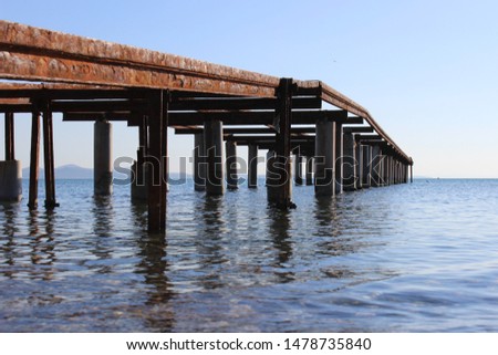 
old pier on the sea