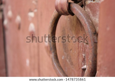 
iron handle on a historic door