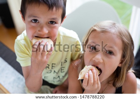 Kids Eating Mini Tacos, Close Up