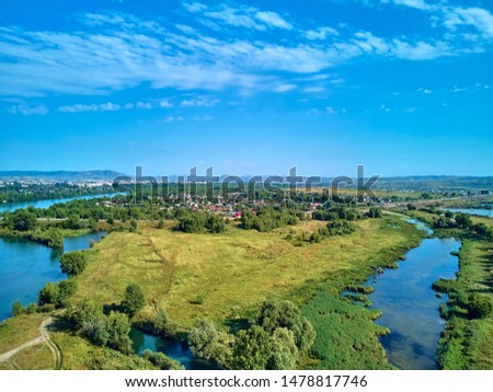 Beautiful panoramic aerial drone view to the confluence of the rivers Irtysh and Ulba in UST-KAMENOGORSK (Oskemen), QAZAQSTAN (Kazakhstan)