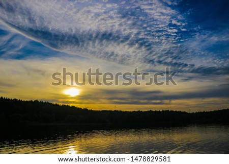 Sunset river water reflection landscape. River sunset reflection. Sunset river landscape. Sunset orange river view.