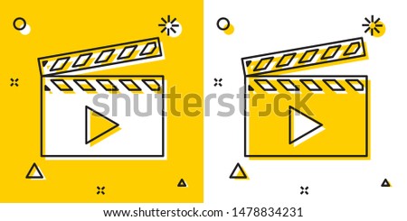 Black Movie clapper icon isolated on yellow and white background. Film clapper board. Clapperboard sign. Cinema production or media industry concept. Random dynamic shapes. Vector Illustration