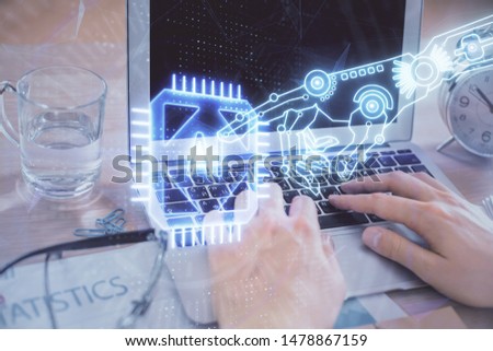Businessman with computer background with technology theme hologram. Concept of big data. Double exposure.