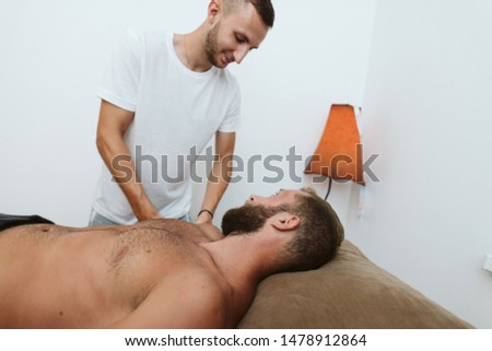 Professional upper body massage of the athlete