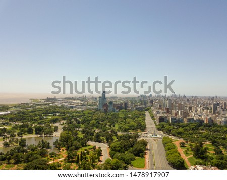 Aerial view with a drone of residentian buildings in Palermo a wealthy neighborhood of Buenos Aires City, Argentina with green areas (park) and the Rio de la Plata river.