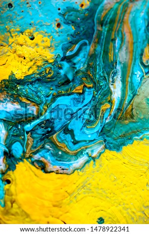 Acrylic liquid abstract pattern made with fluid art technique. 
Mix of yellow and blue acrilic color stains.  Сolorful artistic background Royalty-Free Stock Photo #1478922341