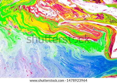 Acrylic liquid abstract pattern made with fluid art technique. 
Mix of yellow, white, green, red  and blue acrilic color stains.  Сolorful artistic background Royalty-Free Stock Photo #1478923964