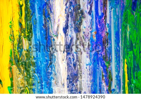 Acrylic liquid abstract pattern made with fluid art technique. 
Mix of yellow, white, green and blue acrilic color stains.  Сolorful artistic background Royalty-Free Stock Photo #1478924390