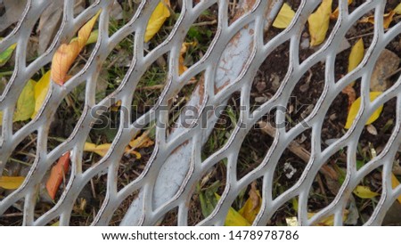 metal and mesh fence in the daytime