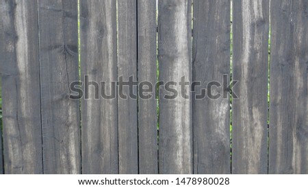 old and wooden fence in the daytime