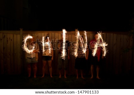 The word China in sparklers time lapse photography