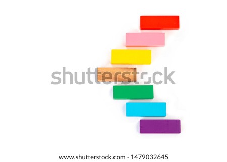 Abstract wooden block on white background. Symbol of leadership, teamwork and different. Business and design concept.