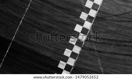 Aerial top view F1 start and finish line asphalt racing background, Formular car background concept. Royalty-Free Stock Photo #1479052652