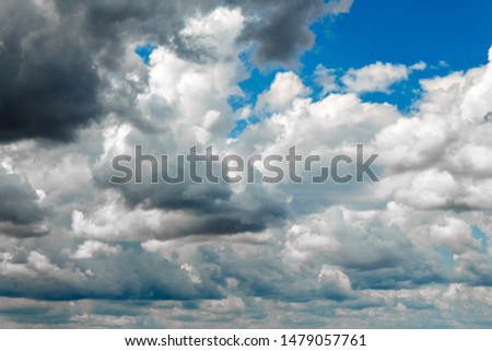 Cumulus Clouds in the blue sky before the storm