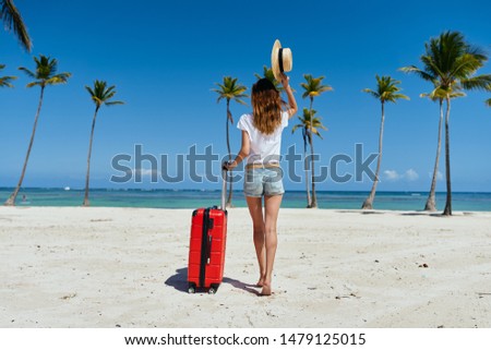 woman with red suitcase travel                               