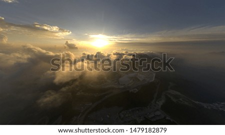 Malaysia Genting Highland with sunset and dramatic cloud. noise are existed in a drone photography