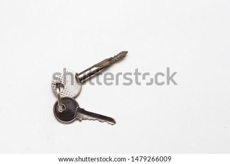 Two stainless keys on the ring