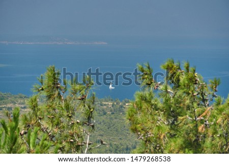 Landscape of green nature and blue sea from the hill Seytan Sofrasi (devil's table), Ayvalik, Balikesir, Turkey. 