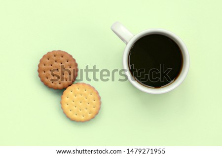 Coffee break flat lay composition with sandwich cookies
