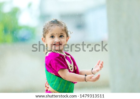 young indian girl in radha costume