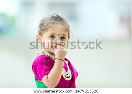 young indian girl in radha costume