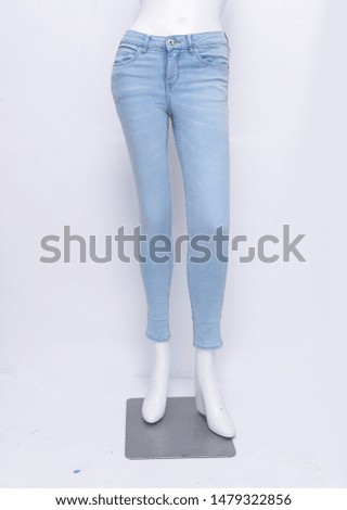 Front view Blue light jeans pants on mannequin
