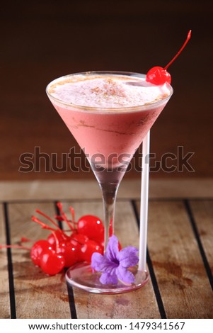 Cocktail Silk Stockings is a very popular beverage with tequila, grenadine, white cocoa liqueur, and cream. It is served in a cocktail glass.
