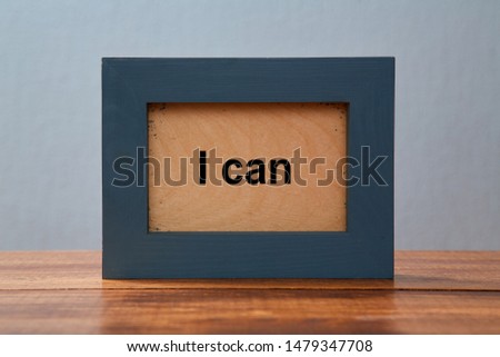 I can. Possible and impossible motivation. Concept for achievement and positive attitude: Photoframe with inscription.