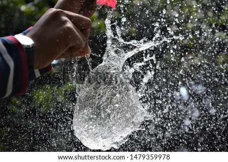 playing a water with shutter speed