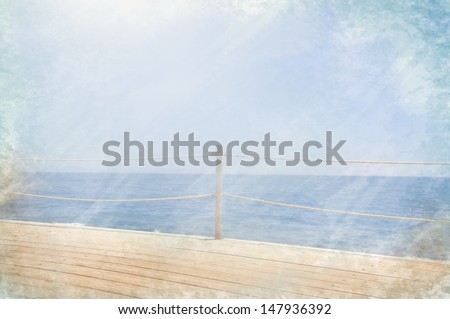 Grunge photo of a bridge on the sea