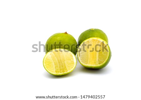 Natural fresh lime with water drops and sliced isolated on white background. clipping path.