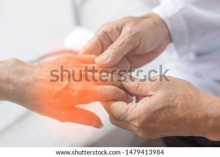 Peripheral Neuropathy concept. Doctor neurologist checkup old patient for symptoms of numbness, prickling or tingling in hands