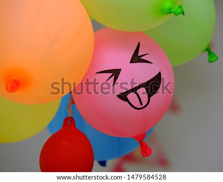 colorful balloons with  smiley face