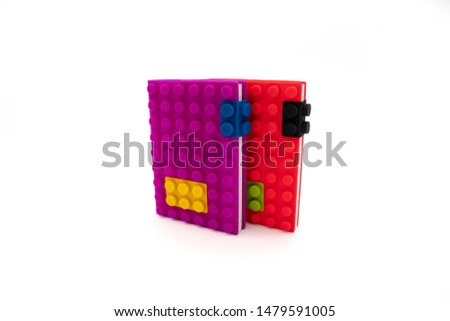 Creative building blocks toys notebooks isolated on white background
