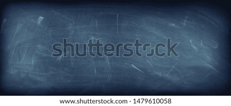 Closeup of blue chalkboard background