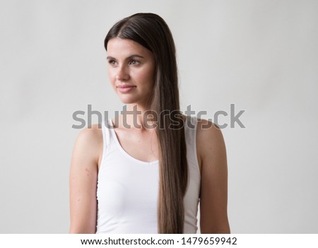 Brunette naturalwoman with long hair portrait casual