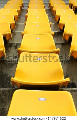 Empty Plastic Chairs at the Stadium 