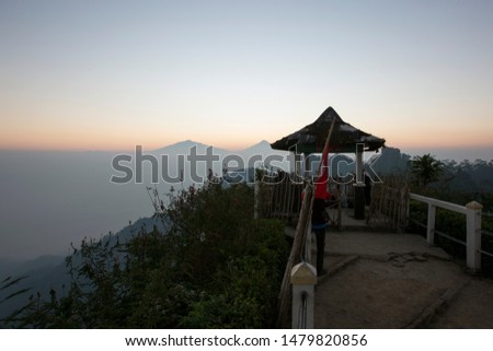 See the beautiful sunrise from the height of the Peak of Suroloyo, Kulon Progo, Indonesia
