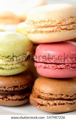 Macarons during a snack with tea cup