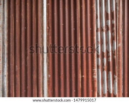 rusty on galvanized sheet wall, background concept on photography image.