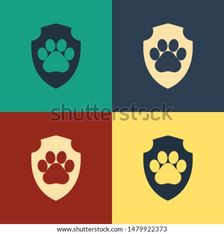 Color Animal health insurance icon isolated on color background. Pet protection icon. Dog or cat paw print. Vintage style drawing. Vector Illustration