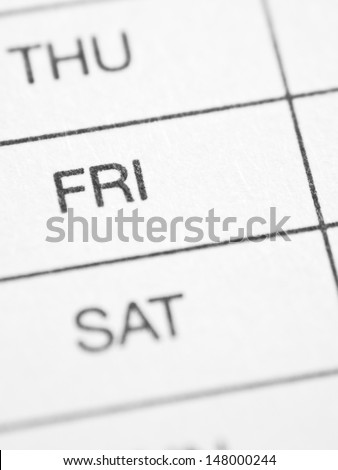 Days of the week: FRIDAY. White paper form close up.