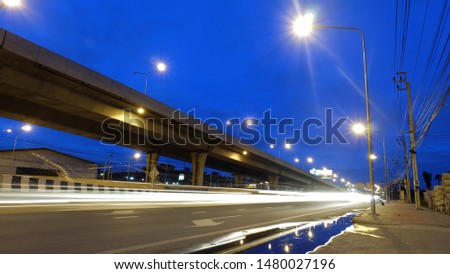 Light trail of cars on the road thailand