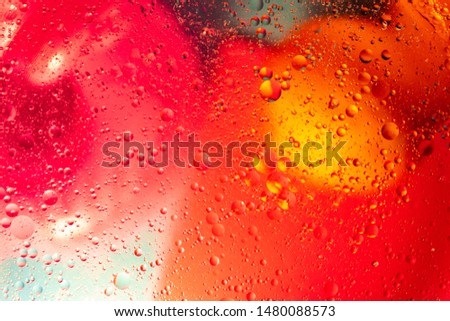 abstract space background. Water drops of different colours. Macro shot of air or molecule. 