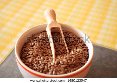 Flaxseed in the porcelain bowl.