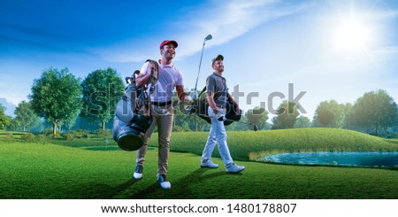 Professional golf player on a golf field