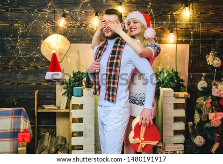  Man handsome with gift box surprise for girlfriend. Man hipster give gift to girl christmas decorations 